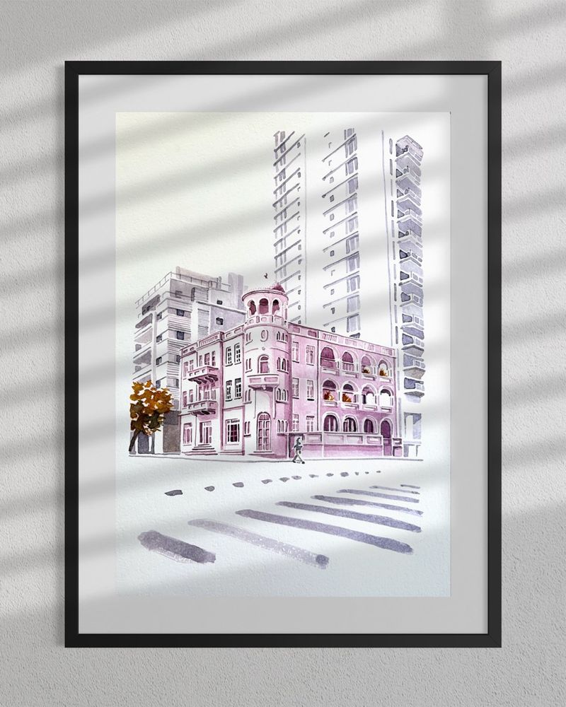 Original Tel Aviv ink painting framed in natural light, showing an eclectic cityscape with a skyscraper, low-rise buildings, and a classical hotel facade.